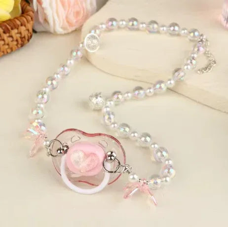 Tétine perlé pastel avec pendentif cœur