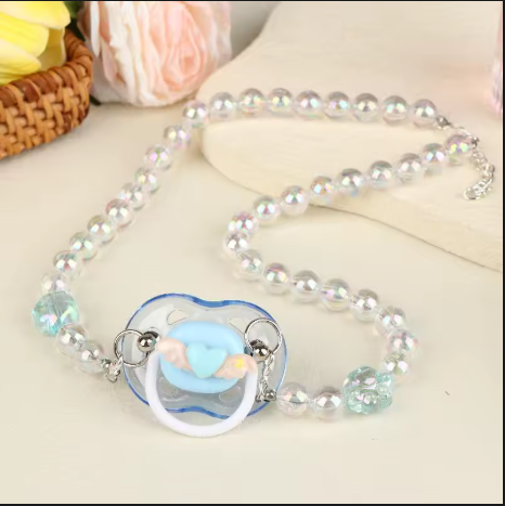 Tétine perlé pastel avec pendentif cœur