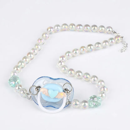 Tétine perlé pastel avec pendentif cœur